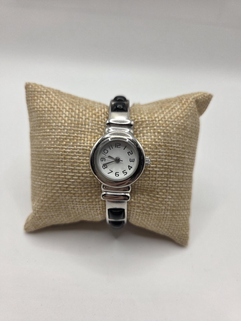 1565. Classic Silver Tone & Black Clamper Bracelet Watch
